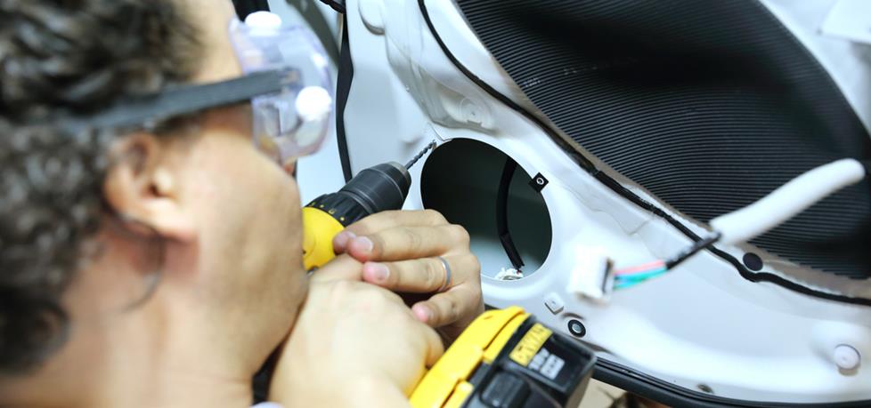 Drilling screw holes for speaker installation